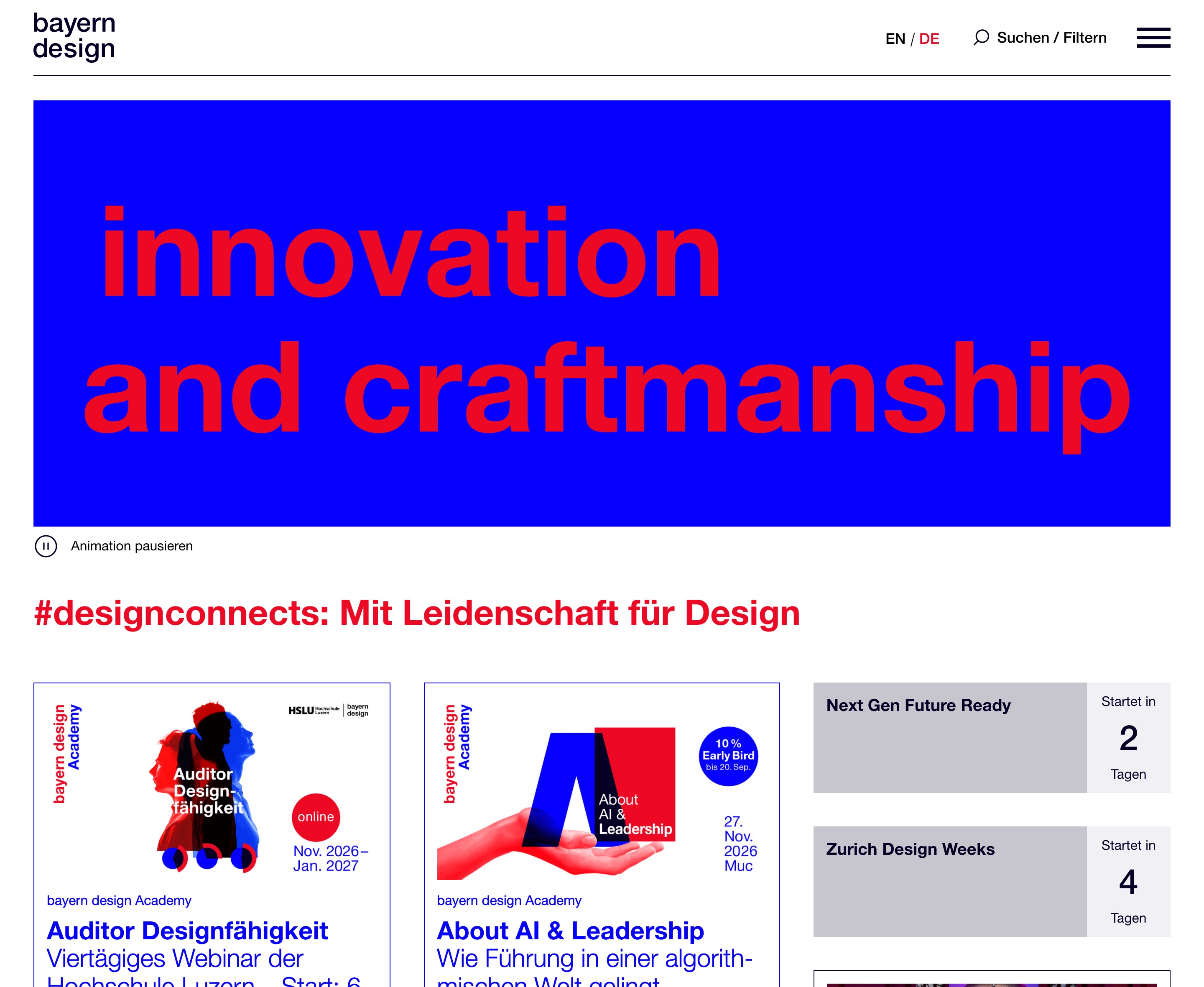 Startseite von bayern-design.de mit animierter Wortmarke in Blau und Rot